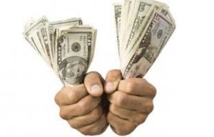 hands gripping money